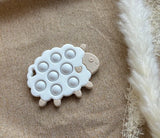 Chewies&more - Silicone Teething Toy - Pop It - Sheep - Beige/White